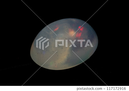 natural rainbow opal gem isolated on black background 117172916