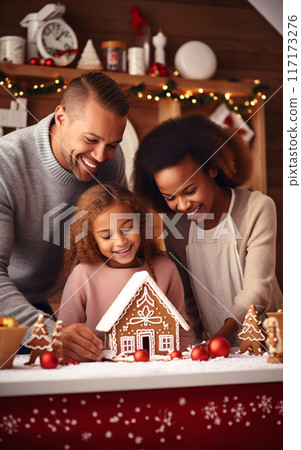 Happy family, father and daughter decorate Christmas gingerbread house together, Christmas and New Year traditions in family Happy family, father and daughter decorate Christmas gingerbread house together, Christmas and New Year traditions in family 117173276