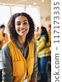 Smiling Female Worker in Warehouse 117173335