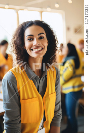 Smiling Female Worker in Warehouse 117173335