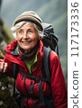 Elderly Woman Enjoying a Mountain Hike 117173336