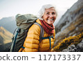 Elderly woman smiling during a hike 117173337