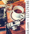 Retro camera and coffee 117174186