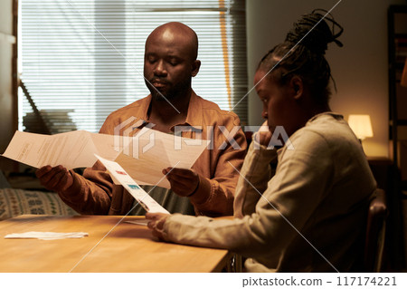 Upset couple with overdue bills Upset couple with overdue bills 117174221