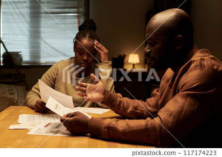 Stressed man expressing misunderstanding Stressed man expressing misunderstanding 117174223
