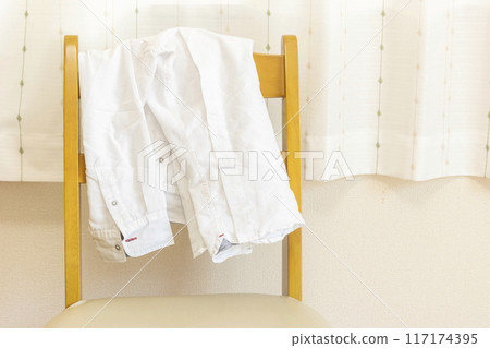 My jacket hanging on a chair My jacket hanging on a chair 117174395