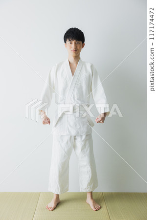Man in judo uniform 117174472