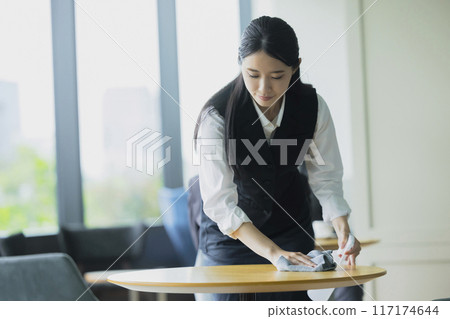 Woman disinfecting alcohol Woman disinfecting alcohol 117174644