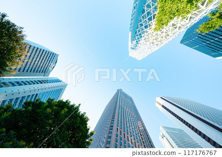 Looking up at Shinjuku's skyscrapers and blue sky from below Looking up at Shinjuku's skyscrapers and blue sky from below 117176767