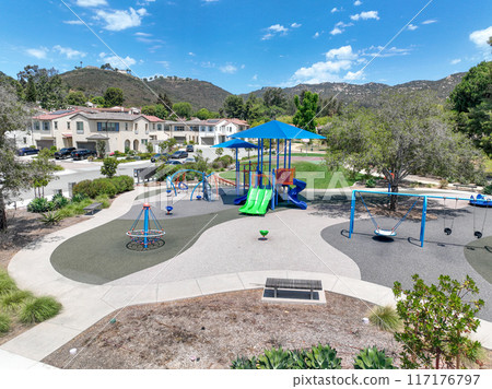 Colorful children playground activities in community public park  117176797