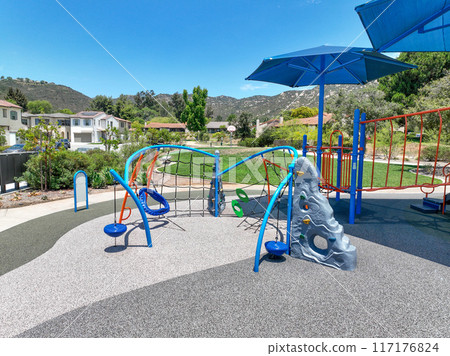 Colorful children playground activities in community public park Colorful children playground activities in community public park 117176824