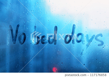 No bed days message written finger on foggy glass wet blue window No bed days message written finger on foggy glass wet blue window 117176858