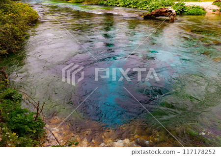 Blue Eye spring (Syri i Kalter), more than fifty metre deep natural pool with clear, fresh water, near Sarande in Vlore Country in southern Albania Blue Eye spring (Syri i Kalter), more than fifty metre deep natural pool with clear, fresh water, near Sarande in Vlore Country in southern Albania 117178252