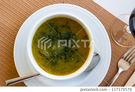Caldo verde served in bowl on table Caldo verde served in bowl on table 117178578