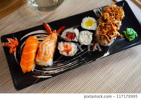 Set of different sushi - maki, california and nigiri. Japanese cuisine 117178995