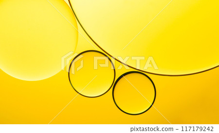 macro abstract photography of oil droplet on yellow gradient background macro abstract photography of oil droplet on yellow gradient background 117179242