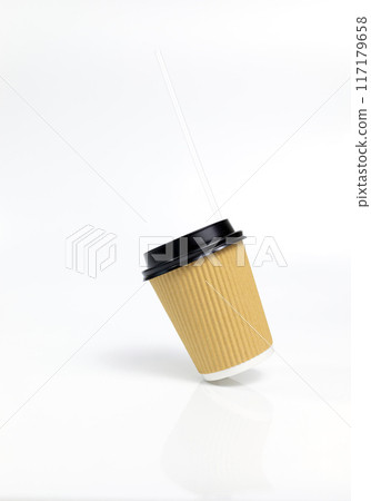 Levitating Isolated Brown Beige Paper Drinks Mug, Cup with Black Lid, Straw On White Background. Eco Hot Beverage Tumbler. On the Go Food Service Application. Vertical Plane, Copy Space. Levitating Isolated Brown Beige Paper Drinks Mug, Cup with Black Lid, Straw On White Background. Eco Hot Beverage Tumbler. On the Go Food Service Application. Vertical Plane, Copy Space. 117179658
