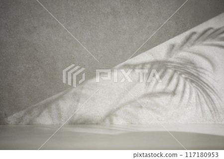 A gray-toned tile background with various props with sunlight coming through the window. A gray-toned tile background with various props with sunlight coming through the window. 117180953