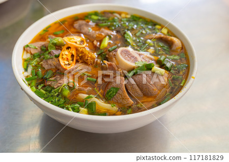 Bowl of traditional and famous Vietnamese noodle dish - Bun Bo Hue 117181829