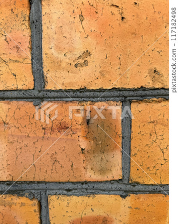 Red brick wall with black joints. Close up. Red brick wall with black joints. Close up. 117182498