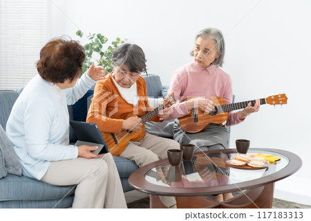Senior woman hobby ukulele 117183313