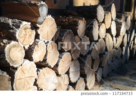 Woodpile of chopped firewood prepared for winter 117184715