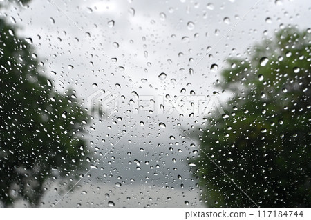 Raindrops on the car window Raindrops on the car window 117184744