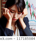 一位鬱悶的女人在股價波動中低著頭 117185084