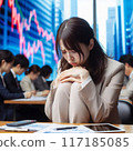 一位鬱悶的女人在股價波動中低著頭 117185085