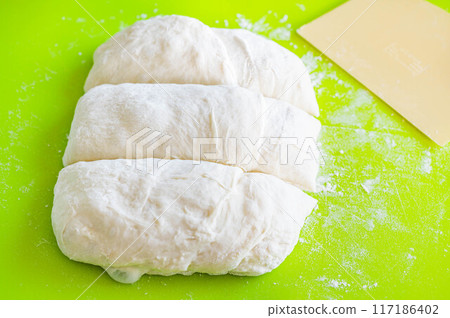 Cut the dough into thirds 117186402