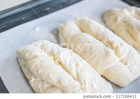 Dough with cuts made after the second rise 117186411