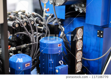 closeup of hydraulic and electrical equipment closeup of hydraulic and electrical equipment 117186770