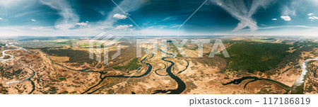 Aerial View Green Countryside Rural forest river Field Meadow Landscape Sunny summer Day. Top View Of Beautiful Nature From High Attitude. Little Small Planet Concept 117186819