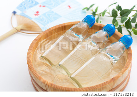 Ramune and a fan cooled in a bucket of water and ice 117188218