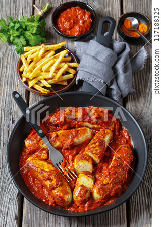 German Currywurst, pork sausages in a curry sauce 117188325