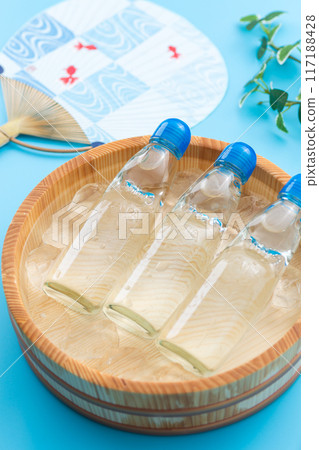 Ramune and a fan cooled in a bucket of water and ice 117188428