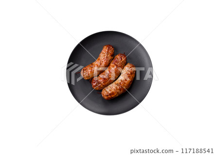 Grilled pork or chicken sausages with salt, spices and herbs 117188541