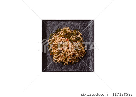 Asian dish rice noodles with salt and spices Asian dish rice noodles with salt and spices 117188582