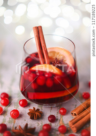 Christmas drink - red spiced mulled wine in glass Christmas drink - red spiced mulled wine in glass 117189225
