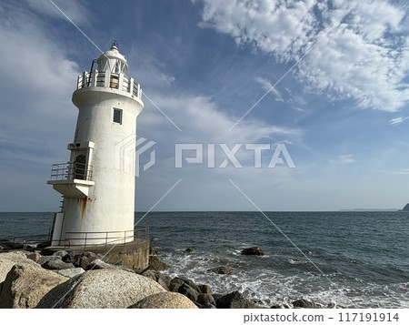 lighthouse sticking out into the sea lighthouse sticking out into the sea 117191914