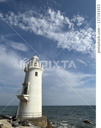 lighthouse sticking out into the sea lighthouse sticking out into the sea 117191915