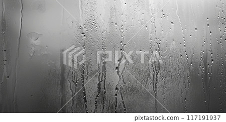Condensation, water drops. Raindrops condensation background texture. Close-up of fogged glass with water drops flowing down 117191937