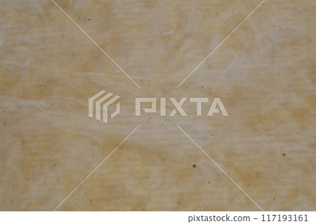 Construction worker thermally insulating house mineral wool attic with glass wool 117193161