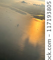 "Sunset from the airplane window: A journey through a breathtaking view of the sea of clouds and the horizon" Aerial footage 4 117193805