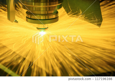 Close up scene the fiber laser cutting machine cut the metal plate with the sparkling light control by CNC program. Close up scene the fiber laser cutting machine cut the metal plate with the sparkling light control by CNC program. 117196166