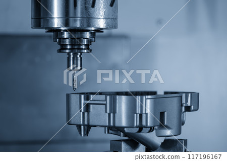 The 4-axis CNC milling machine tapping the motorcycle gear case parts by tapping tool. 117196167