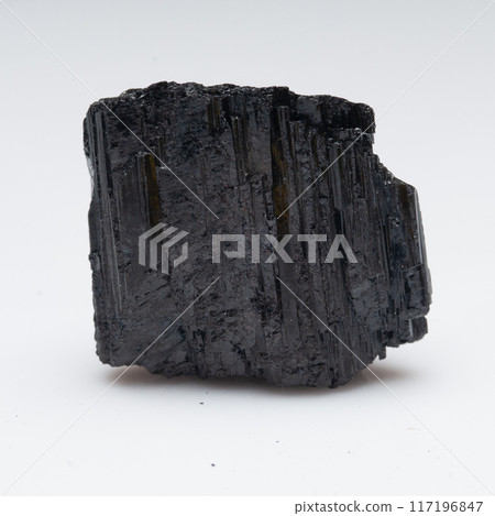 natural black tourmaline scherl on the white background natural black tourmaline scherl on the white background 117196847