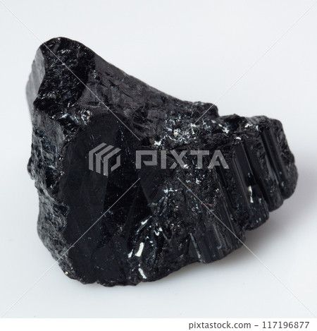 natural black tourmaline scherl on the white background natural black tourmaline scherl on the white background 117196877