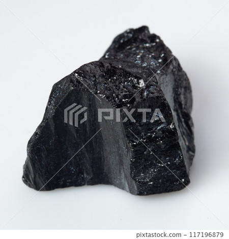natural black tourmaline scherl on the white background natural black tourmaline scherl on the white background 117196879