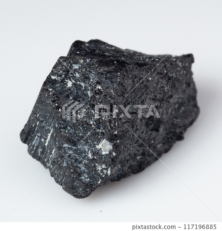 natural black tourmaline scherl on the white background natural black tourmaline scherl on the white background 117196885